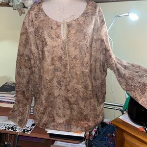 Boho inspired paisley print cream, tan and amberish colors with shimmering hues